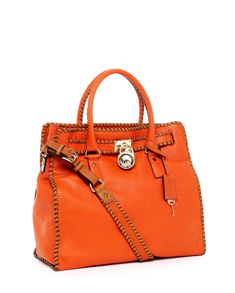 burnt orange Michael Kors purse